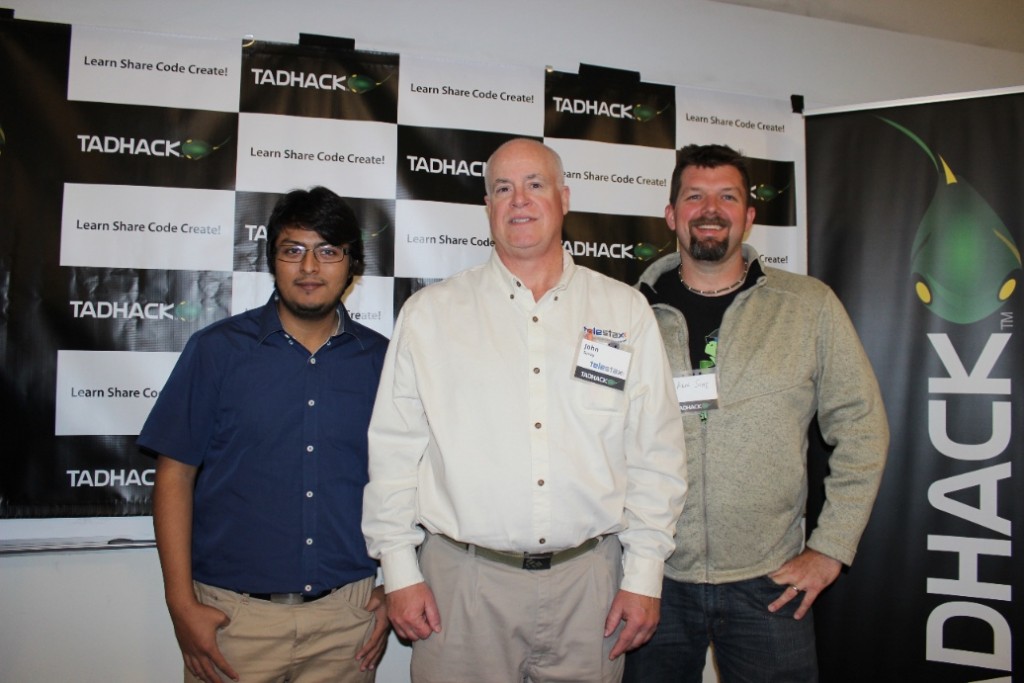 Nestor Bermudez and Arin Sime from WebRTC.ventures pose with John Senay from Telestax after winning a sponsor award from Telestax at the TADHack Chicago in October 2015